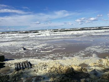 Scenic view of beach against sky