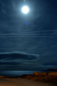 Scenic view of sea against sky at night