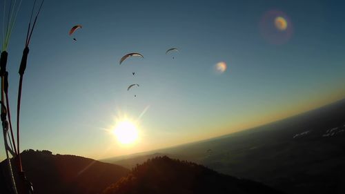 Scenic view of mountains against sky during sunset