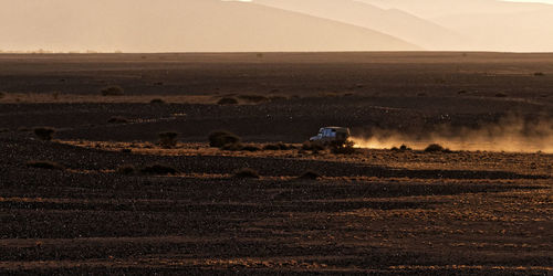 Scenic view of desert against sky