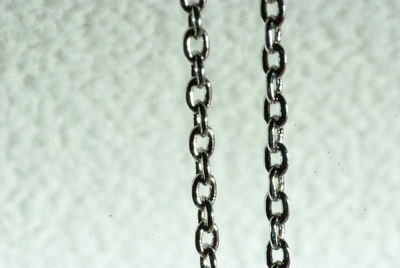 Close-up of chain hanging outdoors