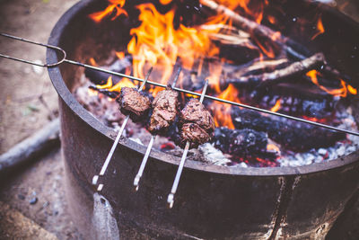 Close-up of meat on barbecue