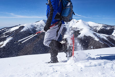 Close-up of snowshoeing activity in the italian alps