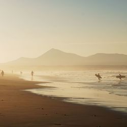 Scenic view of beach against sky