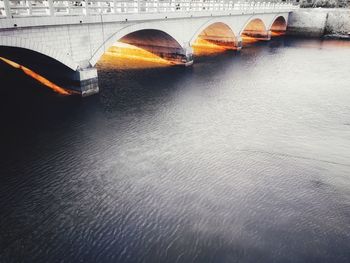 Arch bridge over river