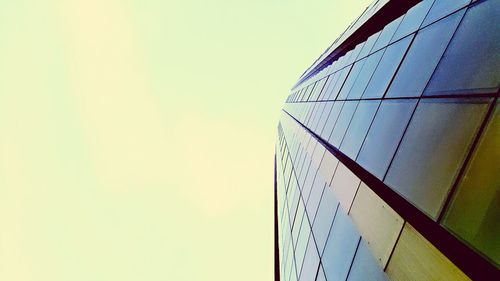 Low angle view of modern building against clear sky