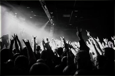 People enjoying music concert