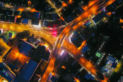 High angle view of light trails on city street at night