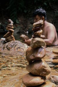 Close-up of stone stack on rock