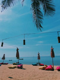 View of decoration on beach against sea and sky