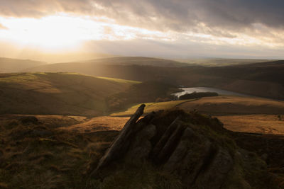 Scenic view of landscape against sky during sunset