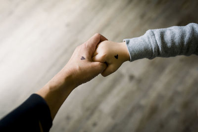 High angle view of people on hand