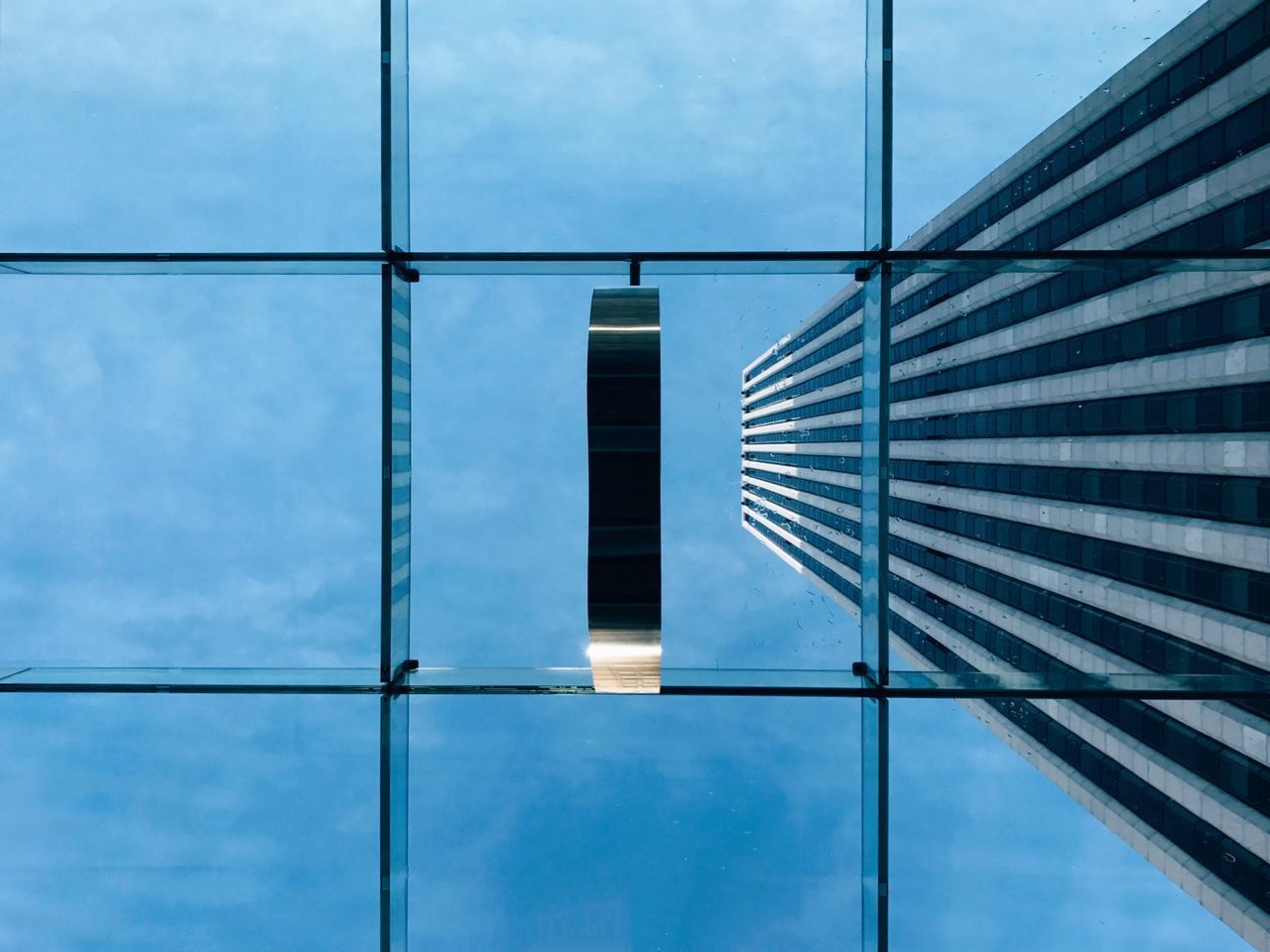 architecture, low angle view, building exterior, built structure, sky, reflection, no people, pattern, day, cloud - sky, modern, outdoors, skyscraper