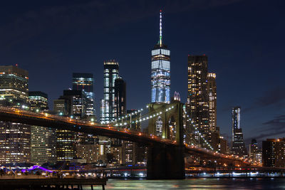 Illuminated buildings in city at night