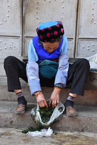 Full length of a man holding food