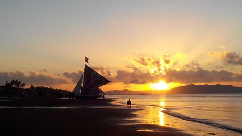 Scenic view of sea at sunset