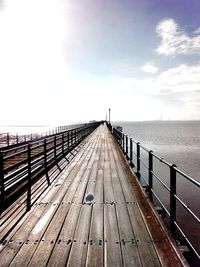 Pier leading towards sea