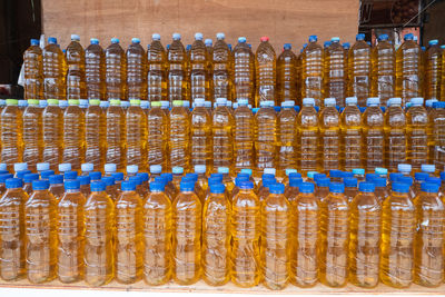 Plastic bottles containing bulk cooking oil, in indonesian it is called minyak goreng curah