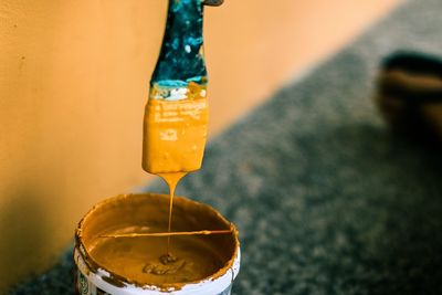 Close-up of paint in container