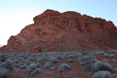 Low angle view of rock formations against clear sky