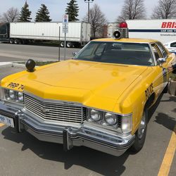 Yellow car on road