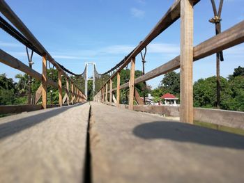 Bridge over road against sky