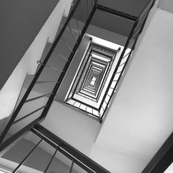 Low angle view of spiral staircase in building