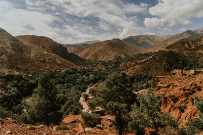 Scenic view of landscape and mountains against sky