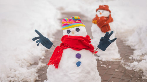 Close-up of christmas decorations on snow