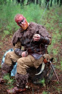 Man sitting in a forest