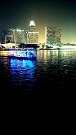 Illuminated cityscape at night