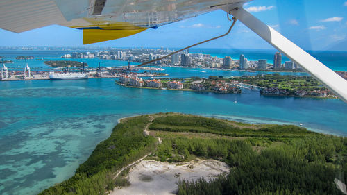 Aerial view from a seaplane of virginia key, fisher island, and south beach in miami, florida.