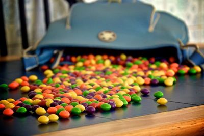 Candies fallen from bag on table