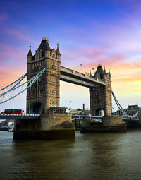 View of bridge over river in city