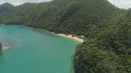 High angle view of bay against clear sky