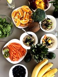 High angle view of fruits in plate on table