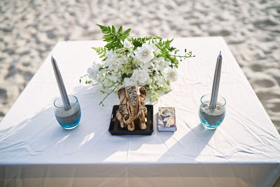 High angle view of flower vase on table