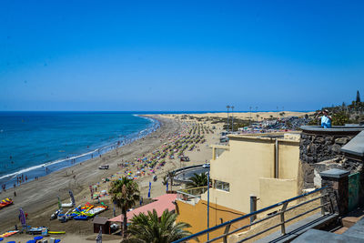 High angle view of beach against clear blue sky