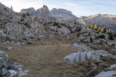 Scenic view of rocky mountains against sky