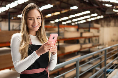 Young woman using mobile phone