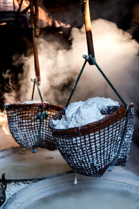 Close-up of ice cream in basket on table