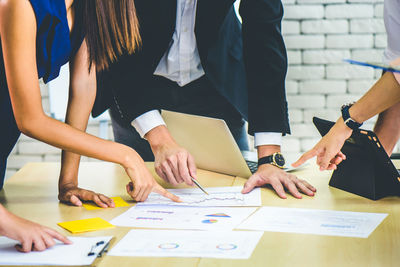 Group of people working on table