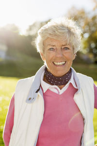 Portrait of senior woman smiling outdoors