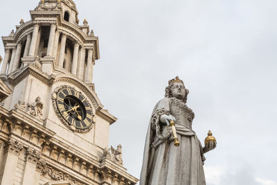 Low angle view of statue of cathedral against sky