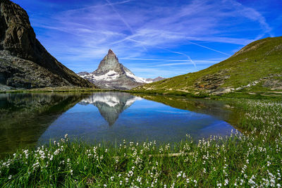 Beautiful reflection of the mattarhorn in the small lake riffelsee.