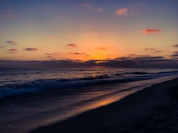 Scenic view of beach during sunset