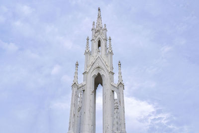 Low angle view of tower of building against sky
