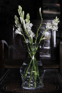 Close-up of white flower vase on table at home