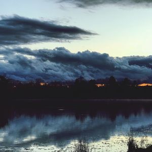 View of lake against cloudy sky