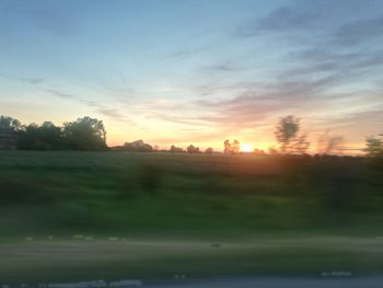 Scenic view of silhouette landscape against sky during sunset